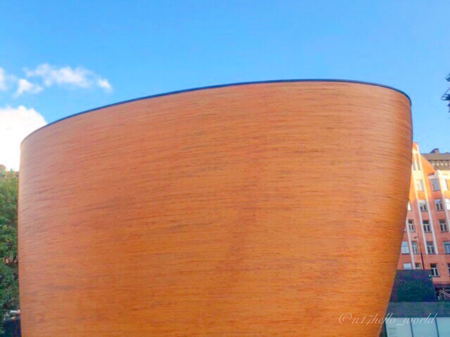 The distinctively shaped, wood-toned Kamppi Chapel