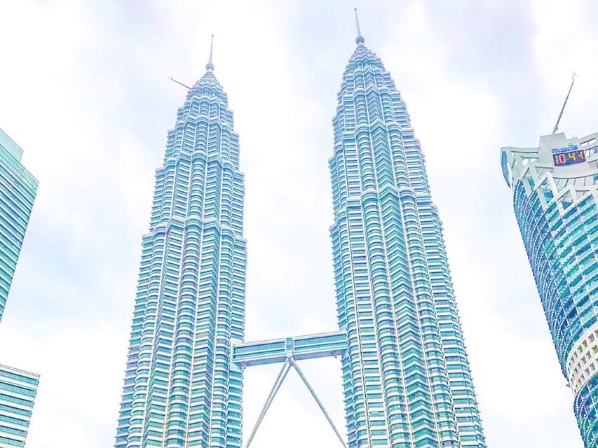 Looking up at the Petronas Twin Towers in Kuala Lumpur