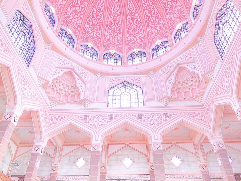 The charming pink-themed interior of the Pink Mosque