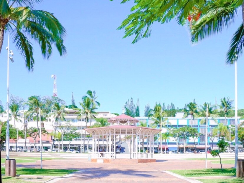The bandstand at Place des Cocotiers surrounded by palm trees